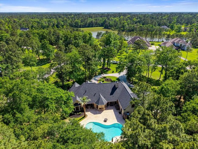 Tucked away on a quiet street in Lake Windcrest, this property offers a peaceful setting with convenience close by. | Image 47