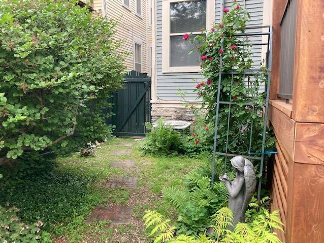 Fencing and landscaping create privacy in the back yard. | Image 29