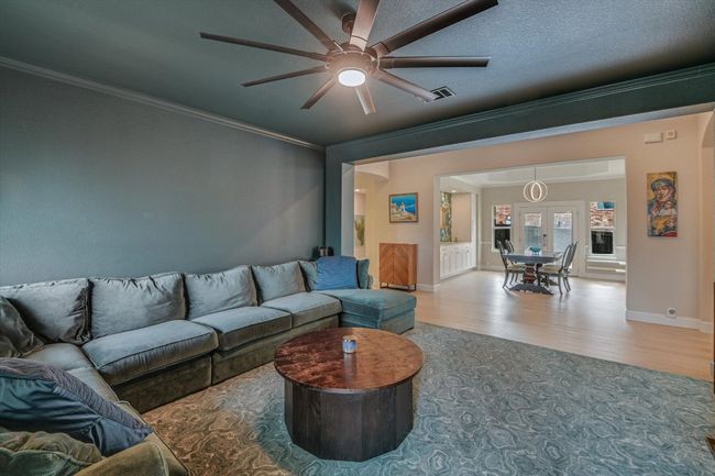 Enjoy the 'moody' theater room with custom paint! | Image 7