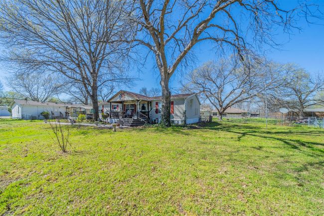 Another side view of the front yard, not too close to neighbors. | Image 15