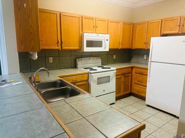 APT-205 - 710 E Boyd Dr, Condo with 3 bedrooms, 2 bathrooms and 2 parking in Baton Rouge LA | Image 4