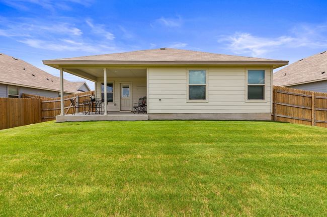 Back of property with a patio and a fenced backyard | Image 35