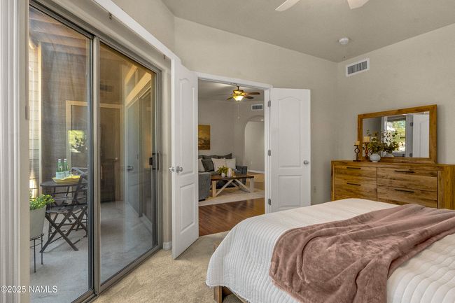 Primary suite with access to the cover patio. | Image 9