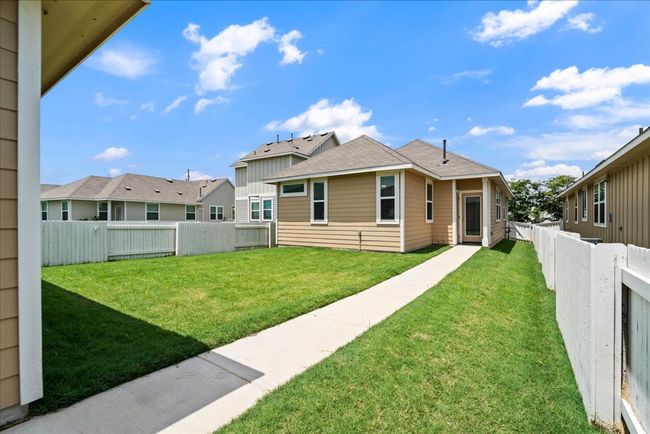 Fenced backyard and private garage with alley access | Image 24