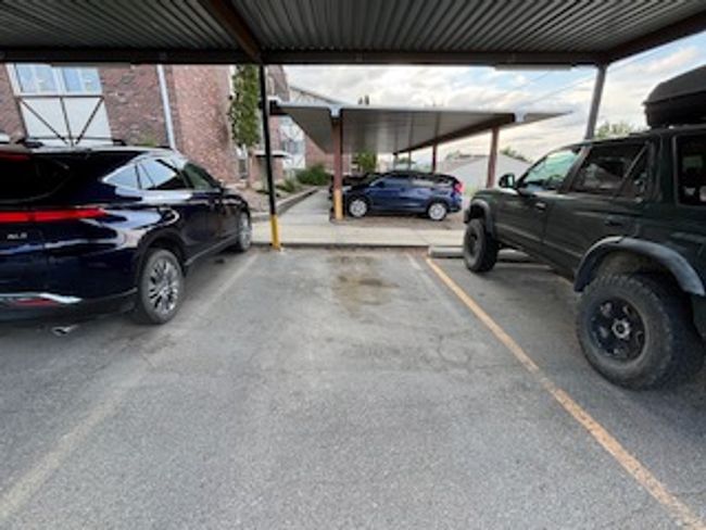 View of covered parking lot | Image 16