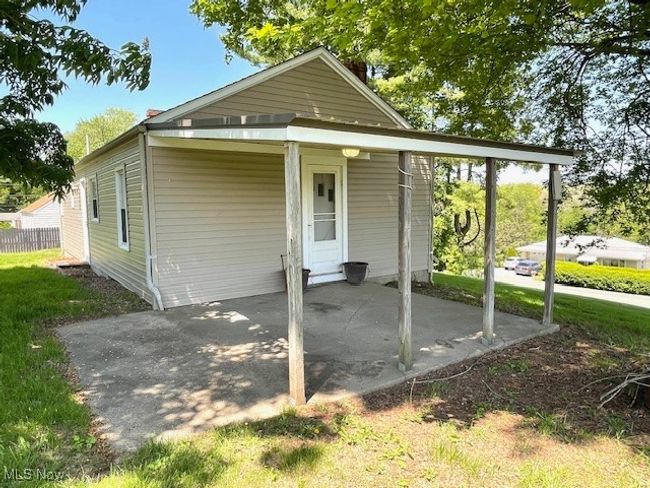 Covered side patio from Family room or 3rd Bedroom. | Image 21