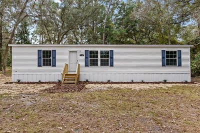 7510 Nw 167 Th Pl, House other with 3 bedrooms, 2 bathrooms and null parking in Trenton FL | Image 1