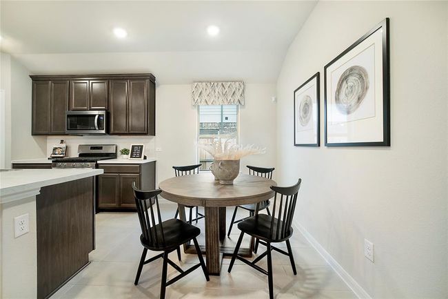 Sample photo of completed home with similar floor plan. As-built color and selections may vary. | Image 4