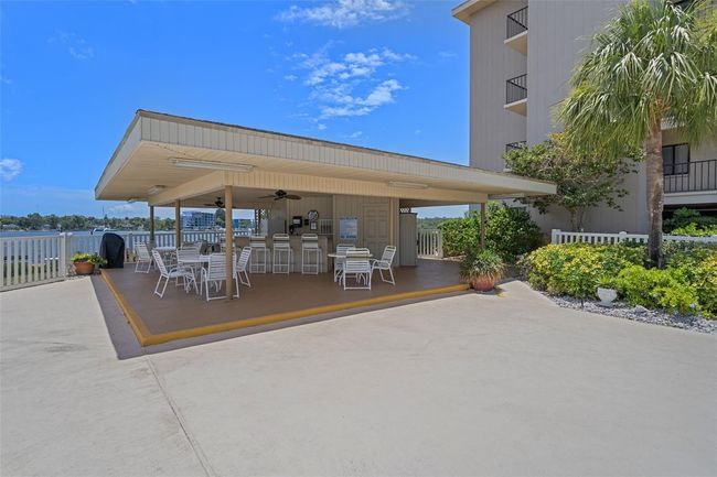 Cabana at each pool with gas grill and refrigerator | Image 56