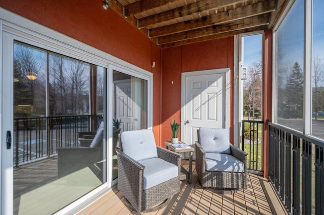 Enjoy sunrises and coffee on your private screened porch | Image 5