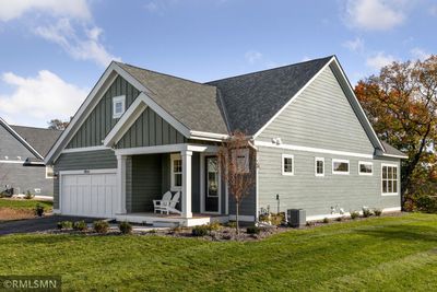 Welcome to the Mayfield plan in the Villa Collection of Robert Thomas Homes! *Pictures of another model home.* | Image 1