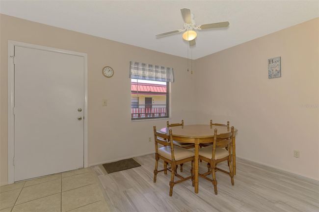 Dining Room with ceiling fan. | Image 10