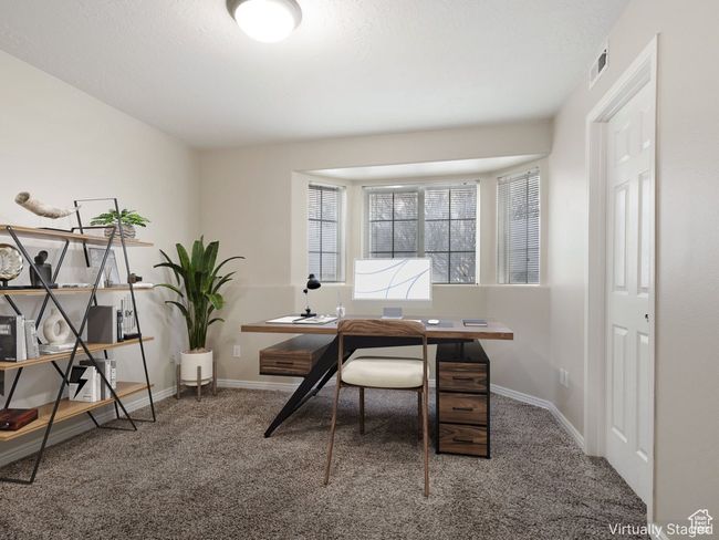 Office space featuring baseboards, carpet flooring, and visible vents | Image 17