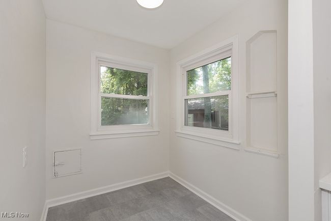 Tiled empty room with a healthy amount of sunlight | Image 19