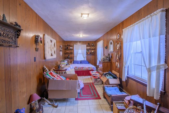 Guest bedroom or office off the breezeway. Current owners use this space as a guest bedroom, however, there is no built-in closet. | Image 17