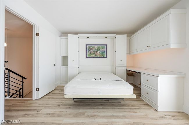 Bedroom with built in desk and Murphy bed | Image 29