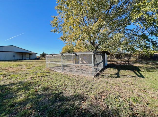 View of yard with an outbuilding and exterior structure | Image 12
