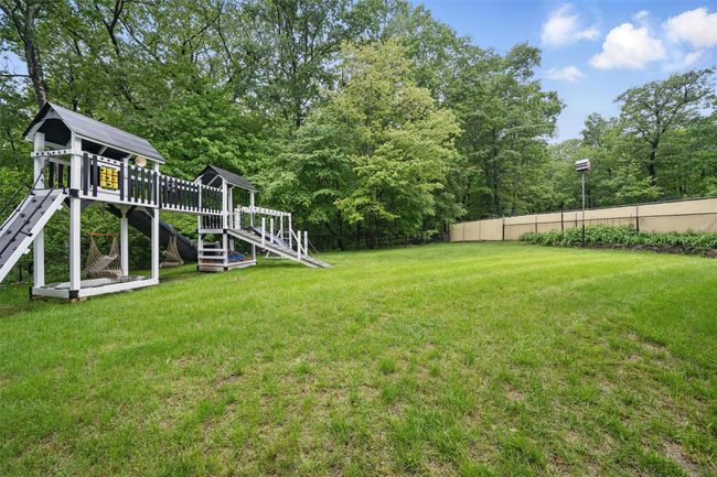 View of yard with a playground | Image 44