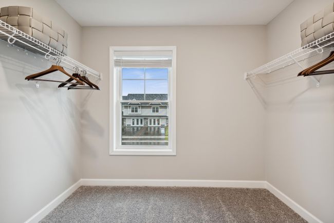 Large owners suite walk in closet! *Photos are of a model home, some features and colors may vary. | Image 20