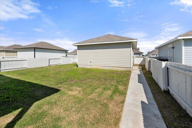 View of yard featuring a fenced backyard | Image 32