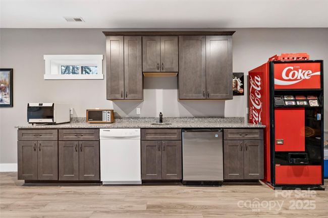 Wetbar in basement | Image 32