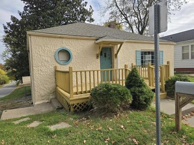 View of front of house with a deck | Image 1