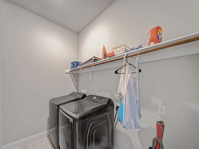 Washroom with independent washer and dryer and baseboards | Image 34