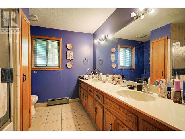 215 Arab Rd, House other with 8 bedrooms, 6 bathrooms and 5 parking in Kelowna BC | Image 22