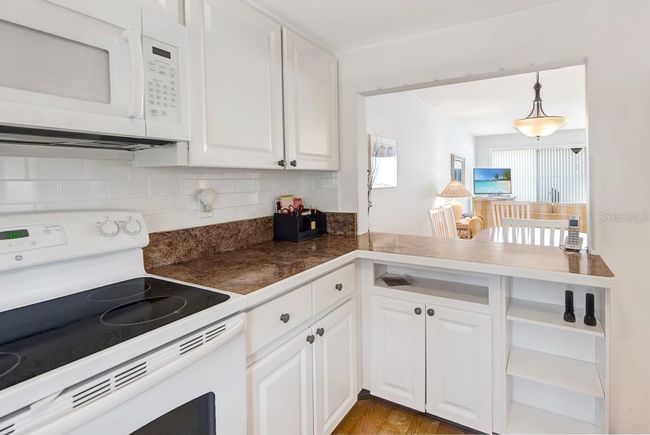 UNIT-111 - 600 Manatee Ave, Condo with 2 bedrooms, 2 bathrooms and null parking in Holmes Beach FL | Image 6
