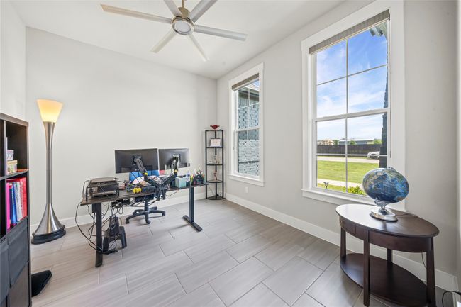Home office with baseboards and ceiling fan, 4 bedrooms, Media room, everything you could ask for! | Image 24