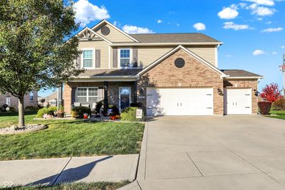 Three car garage with storage | Image 3