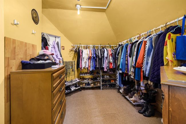 Upstairs closet connects 2 bedrooms | Image 27