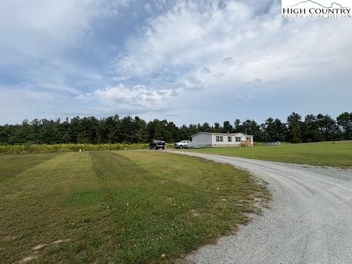 111 Wilderness Family Trl, Ennice, NC, 28623-8907 | Card Image