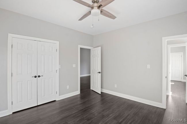 3rd bedroom with ceiling fan/overhead lighting | Image 16