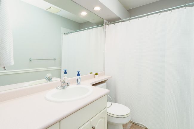 Full bathroom with vanity, toilet, and recessed lighting | Image 27