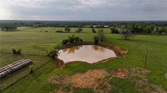 Birds eye view of property featuring a water view and a rural view | Image 16