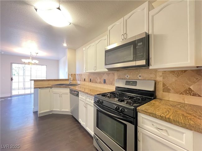 7725 Allano Way, Townhouse with 2 bedrooms, 3 bathrooms and null parking in Las Vegas NV | Image 8