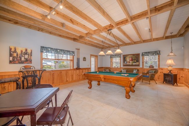 Lower level family room. Electric wood stove heats this area so it couldn't be counted in sq. ft. | Image 30