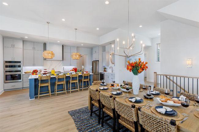 Open floor plan with dining table that sits 10. | Image 12