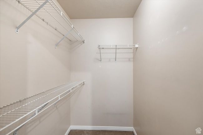 Master Bedroom Walk in closet with carpet | Image 21