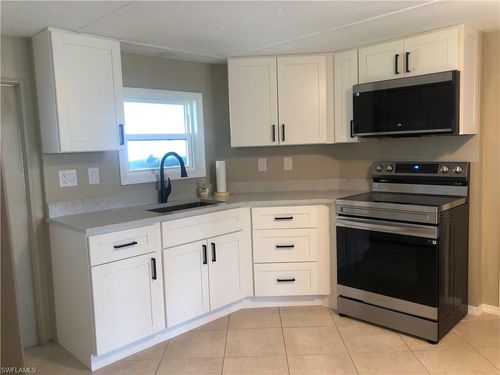 135 Chisholm Trl, NORTH FORT MYERS, FL, 33917-3060 | Card Image