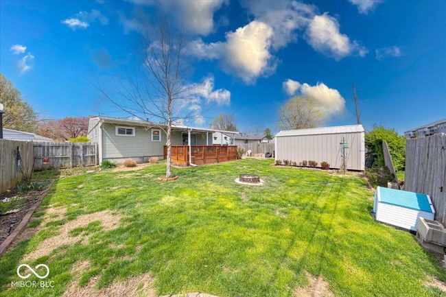 comes with the huge storage shed and a fire pit area | Image 8