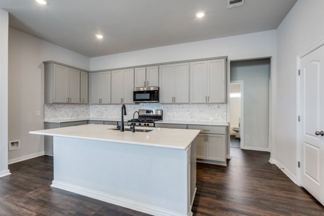 509 Oleander Loop, House other with 4 bedrooms, 3 bathrooms and 4 parking in Buda TX | Image 12