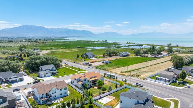 Aerial view of residential area with a water and mountain view | Image 39