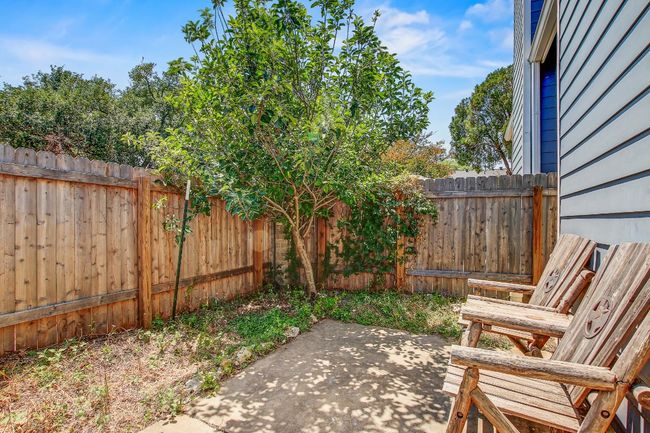 Fenced backyard featuring a patio | Image 16
