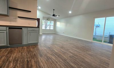 Great room with dining area. | Image 2