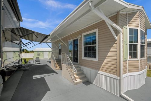 4965 Shore Line Dr, POLK CITY, FL, 33868-9306 | Card Image