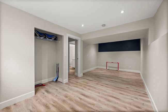 Basement featuring recessed lighting, light wood-style flooring, and baseboards | Image 29