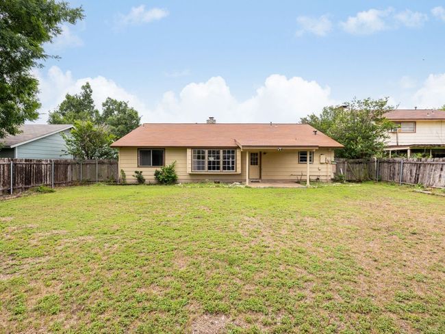 Rear view of property with a patio and a fenced backyard | Image 21
