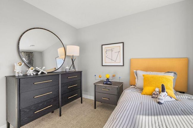 Spacious bedroom #2. Photo is of model home. Colors and options may vary. Ask Sales Agent for details. | Image 27
